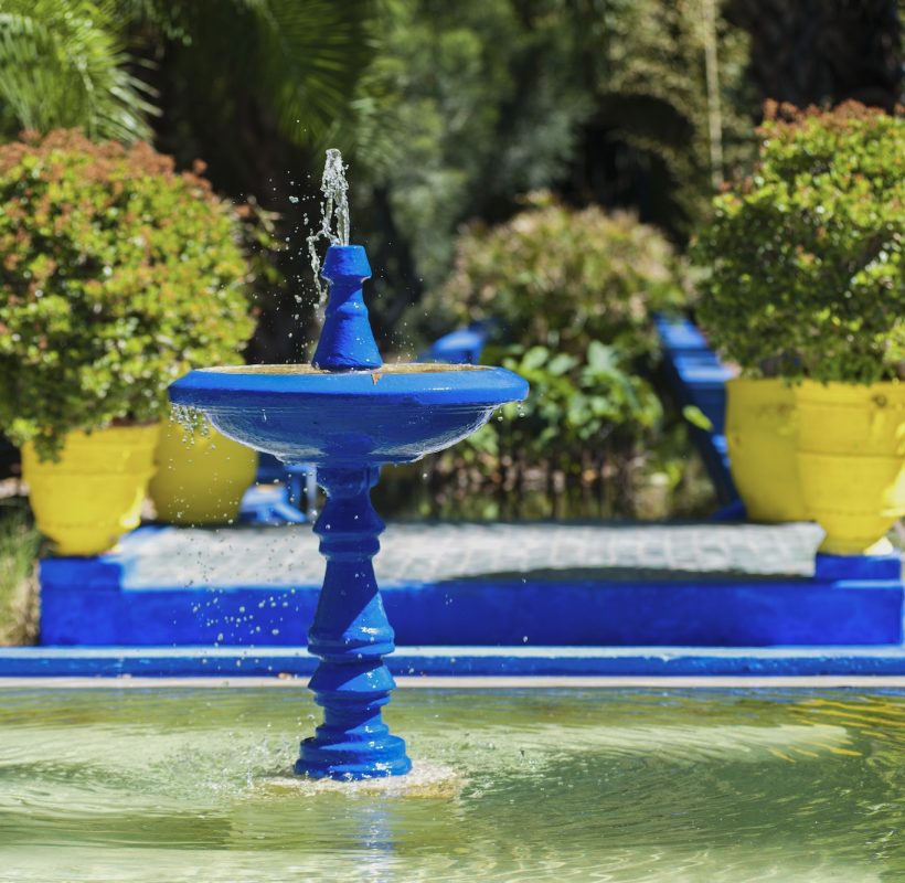 Blue fountain at Majorelle Garden, aka Garden of Yves Saint-Laurent, Marrakech (Marrakesh), Morocco, Sahara Desert Tour Marrakech to Fez